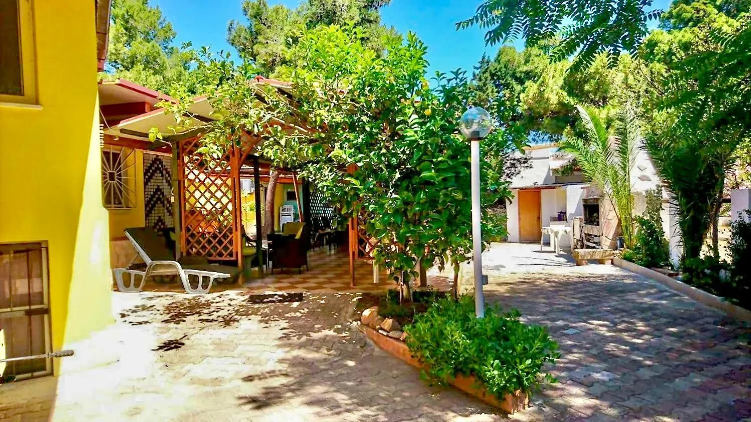 Holiday home Villa Mimosa Porto Pino Italy